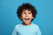 © Marina Shvedak - portrait of a child with emotion on his face, surprised facial expression of a boy saying wow