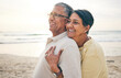 © Charlize D/peopleimages.com - Love, hug and senior couple at beach happy, relax and bond in nature together. Ocean, embrace and old people hugging at the sea for travel, vacation and enjoy retirement with holiday, freedom or trip