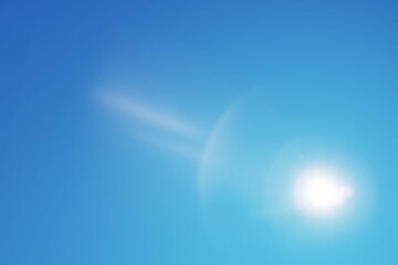 Wall Mural - bright sun on clear bright blue sky.