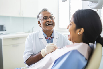 Indian elderly woman getting dental treatment