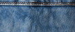 Closeup of denim trousers with leather blank label on blue jeans. Machine stitch close up. Denim texture in blue. Blank leather label denim jeans, fabric background with copy space. Generative ai