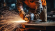 © ttonaorh - Industrial workers in a factory welding steel structure with sparks. Metalwork manufacturing and construction concept