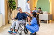 © Art_Photo - Portrait of asian woman physiotherapist trainer carer help physical and discussing consulting with asian senior patient by doing yoga workout exercises in rehabilitation at hospital.senior healthcare
