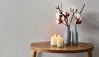 Stylish table with cotton flowers and aroma candles near light wall. Banner for design , generated by AI