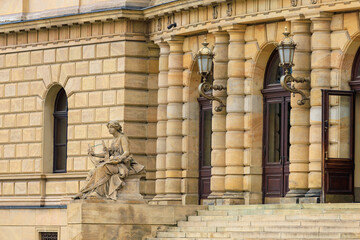 Ancient sculptures in the architecture of the city. Historical and cultural heritage. Background.