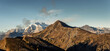 Dolomites, Italy - Panorama of the Dolomites in autumn, the snow-capped Marmolada in the background. Banner format.