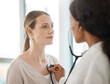 © Wayde Oostendorp/peopleimages.com - Doctor listening to stethoscope heartbeat, patient breathing and lungs for healthcare checkup, test and consulting in hospital. Woman with medical screening from cardiology physician for tuberculosis