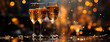 Happy New Year 2024. Christmas and New Year holidays bokeh background with copy space. With champagne glasses against holiday lights.
