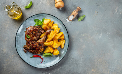 Roasted duck leg with potatoes. Restaurant menu, dieting, cookbook recipe top view