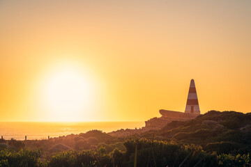 Canvas Print - Robe Obelisk viewed towards the ocean from the walking trail at sunset, Limestone coast, South Australia