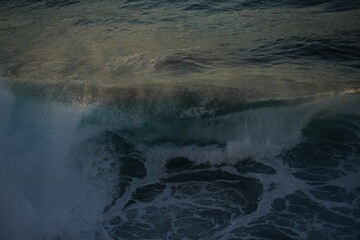 Sticker - effects of waves and the ocean on the coast at sunset