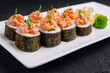 Sushi roll with salmon and caviar