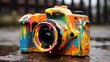 camera covered in paint
