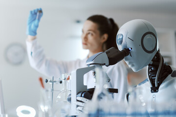 Wall Mural - scientist and robot working together in the lab