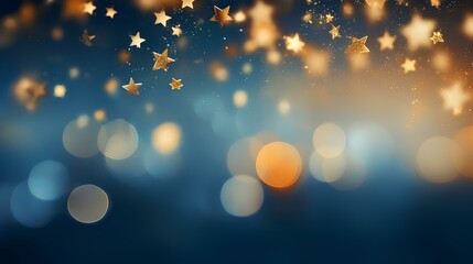 Golden shiny stars on a blue background with a defocused backdrop in bokeh style