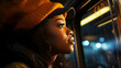 A woman on a train looking out the window, wearing an orange knitted hat in the style of hip hop aesthetics, captured the essence of the moment. Afro-Caribbean influence