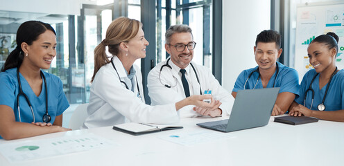 Canvas Print - Doctor with laptop, team and health, meeting and professional collaboration on medical innovation and healthcare policy. Teamwork in conference room, diversity and group discussion at the clinic.