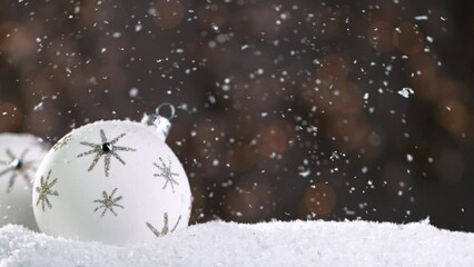 Sticker - Christmas Still Life with Bokeh Lights and Snowflakes Falling. Super Slow Motion Filmed on High Speed Cinema Camera at 1000 fps.