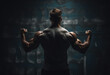 Back view of man with very strong illuminated shadow flexing muscles on dark wall background