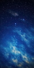 Wall Mural - A captivating image of a night sky filled with stars and wispy clouds. This picture can be used to depict the beauty of the night, astronomy, or as a background for various projects