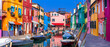 Italy travel and landmarks. Most colorful places (towns) - Burano island, village with vivid houses near Venice.