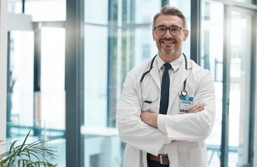 Canvas Print - Mature man, arms crossed and doctor in hospital, healthcare and wellness clinic with trust, vision or help motivation. Portrait, smile or happy consulting medical worker or surgery insurance employee