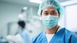 © ETAJOE - Male asian Doctor or surgeons in operating room , Medical Performing Surgical Operation in Modern Operating Room