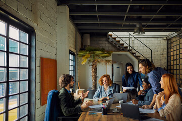 Multicultural businesspeople working on a project in the office