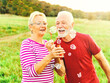 © Lumos sp - woman man outdoor senior couple happy fun retirement together bubble soap blowing love old nature mature