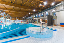 Indoor Swmming Pools With Lots Of Facilities And Equipment. High Quality Photo