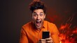 excited young man play games by mobile phone make winner gesture. male winning mobile gambling. Wow face expression. Esport streaming game online, surprise, gamer, online, earning, new generation