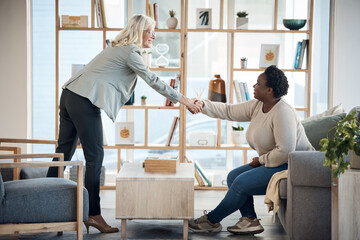 Canvas Print - Women, handshake and meeting for counseling support, thank you and welcome or introduction to therapy. Therapist shaking hands with patient or people for hello, consulting or agreement in psychology