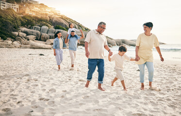 Wall Mural - Holding hands, big family and walking at a beach for travel, vacation and fun in nature together. Freedom, parents and children relax with grandparents at the sea on holiday, trip or ocean adventure