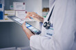 © Sharne/peopleimages.com - Woman, pharmacist and hands on tablet in medical research, inventory or ecommerce order on pharmacy app. Closeup of person or healthcare professional working on technology for telehealth or checklist