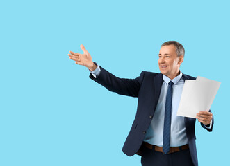 Poster - Mature actor with film script on blue background