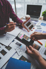 Creative business team in mobile software design project, brainstorming meeting, working together, internet technology in smartphone web part, teamwork concept, colleagues.