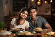 young indian couple enjoying dinner together at restaurant