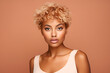 Young adult happy Black woman beauty female model, pretty cool gen z African lady with short blond hair healthy face skin and nose piercing looking at camera isolated at beige background