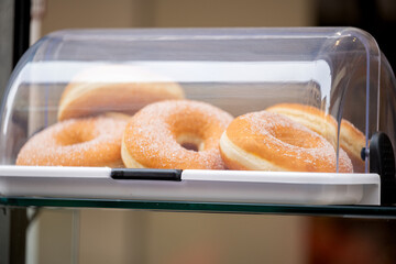 Poster - Donuts on display in a cafe