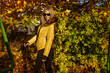 © marcink3333 - Beautiful woman wearing an winter jacket is posing outdoors on a sunny autumn day.