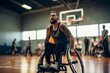 Young man playing a game of wheelchair basketball.