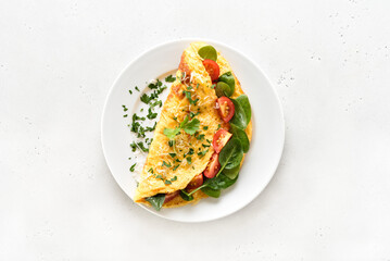 Canvas Print - Stuffed omelette with tomatoes and spinach