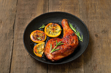 Wall Mural - Roasted chicken leg on plate