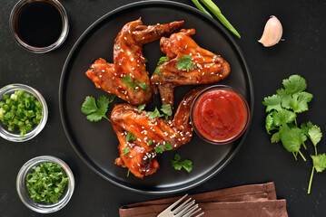 Poster - Baked chicken wings on plate