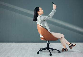 Poster - Selfie, video call and woman with a phone for connection, signal and communication at work. Conversation, corporate and Asian employee reading an email, message or chat on a mobile app in an office