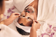 Wellness, Eye Mask And Mature Man At A Spa For Health, Self Care And Zen Treatment. Relax, Calm And Masseuse Hands Doing A Beauty Facial Massage Routine On A Senior Male Person At Luxury Peace Salon.