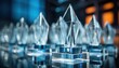 Photo of a Shimmering Display of Achievement: Crystal Trophies Gleaming on a Table