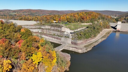 Wall Mural - Hammond-Lakes Dam and Reservoir in Tioga, Pennsylvania peaceful lake and water in Autumn Fall colors in mountain trees in morning sunlight where boating and fishing is permitted