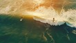 Top view of surfing on wave with perfect waves with surfers in ocean.