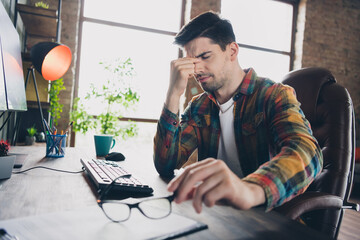 Poster - Photo of exhausted unhealthy hardware engineer suffer headache hand hold eyeglasses workstation office indoors